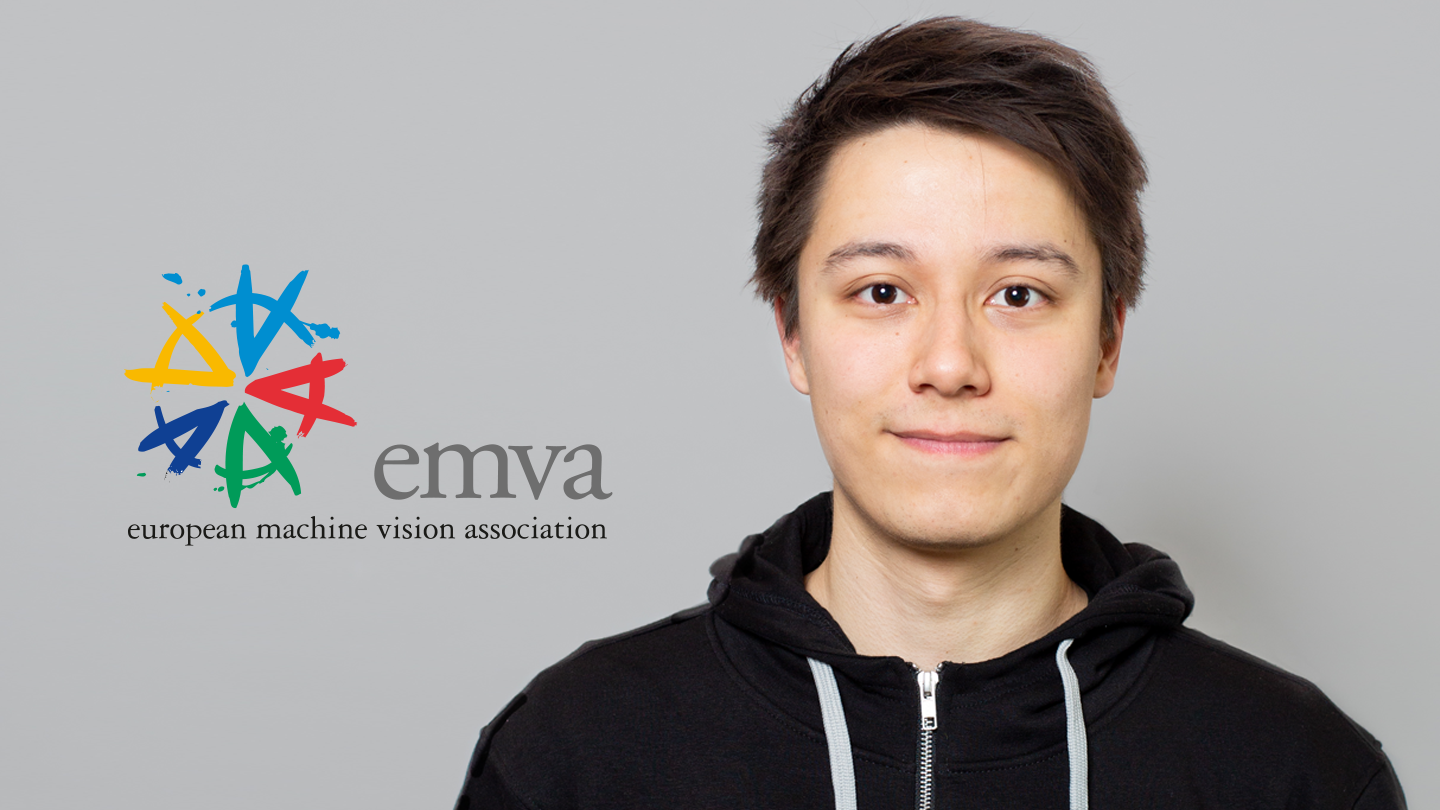 Karsten Roth, a PhD student at the University of Tübingen, is seen on the right, the EMVA logo is seen on the left