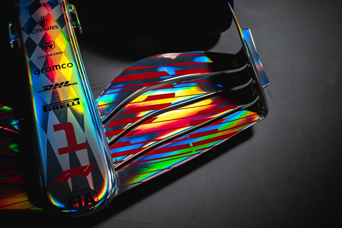 Image shows an overhead of the right panel of the front wing of the 2022 F1 car, the panel and car are iridescent