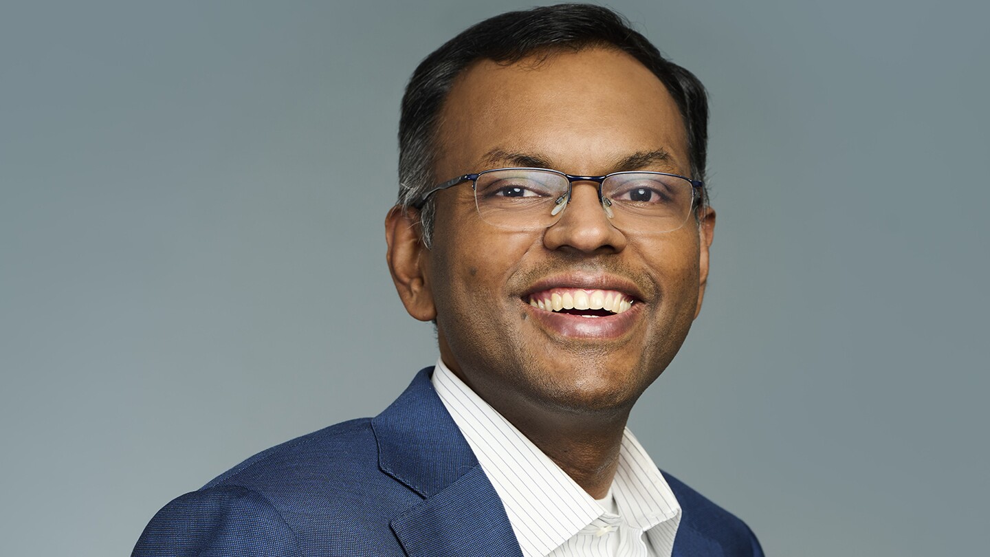 Swami Sivasubramanian, vice president of database, analytics, and machine learning at AWS is seen smiling in a portrait photo