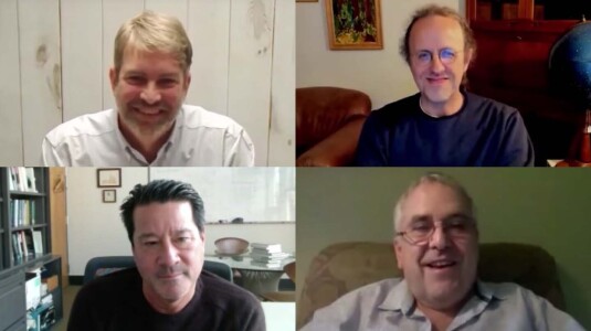 Amazon Scholars Michael I. Jordan and Michael Kearns and Amazon distinguished scientist Bernhard Scholkopf NeurIPS Amazon Science.jpg