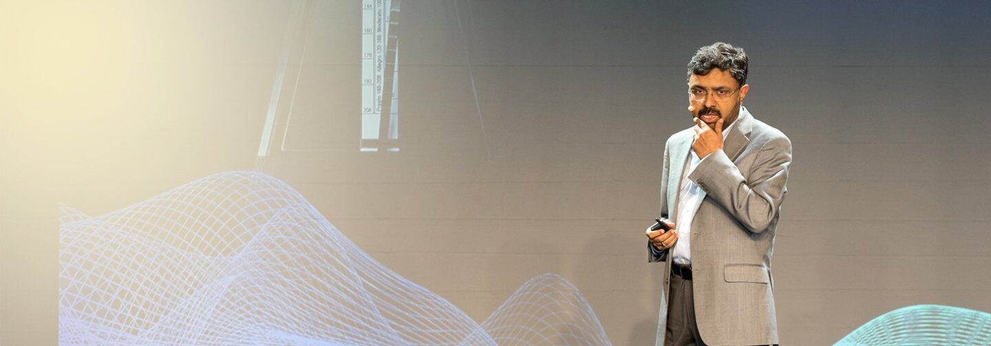Prem Natarajan, Alexa AI vice president of natural understanding, giving a presentation
