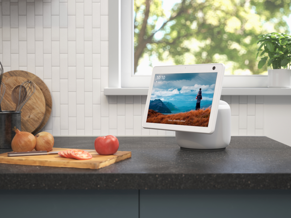 Echo Show stationed on a kitchen counter.