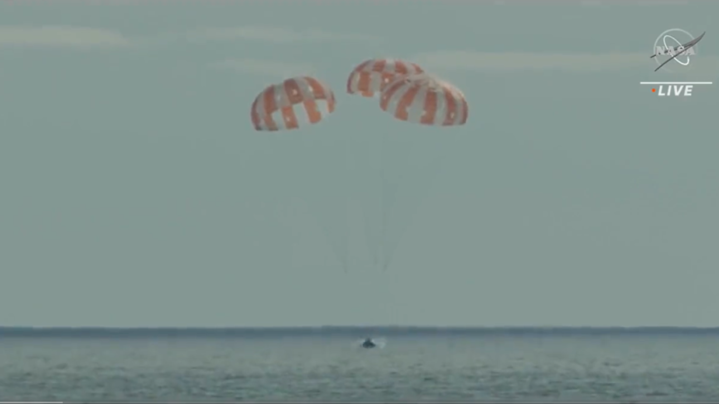 NASA's Orion spacecraft shown splashing down in the Pacific Ocean, west of Baja California, at 9:40 a.m. PST Sunday, Dec. 11.