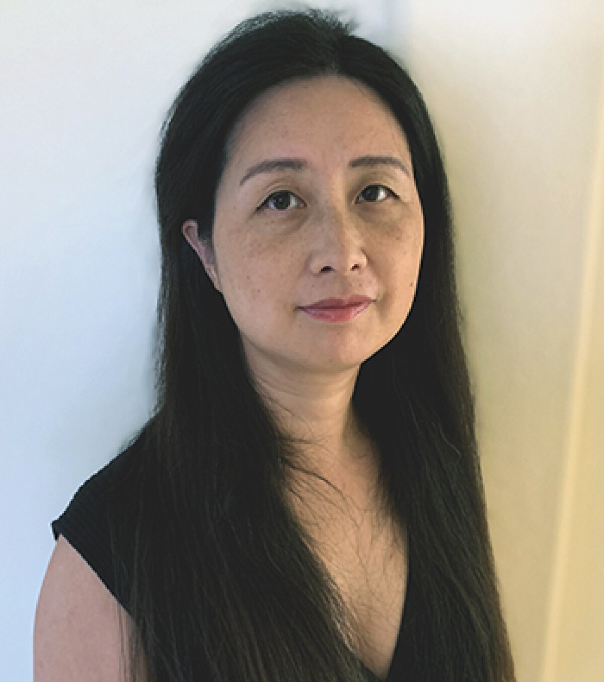 Ying Ding, a professor at the University of Texas, Austin, is looking into the camera