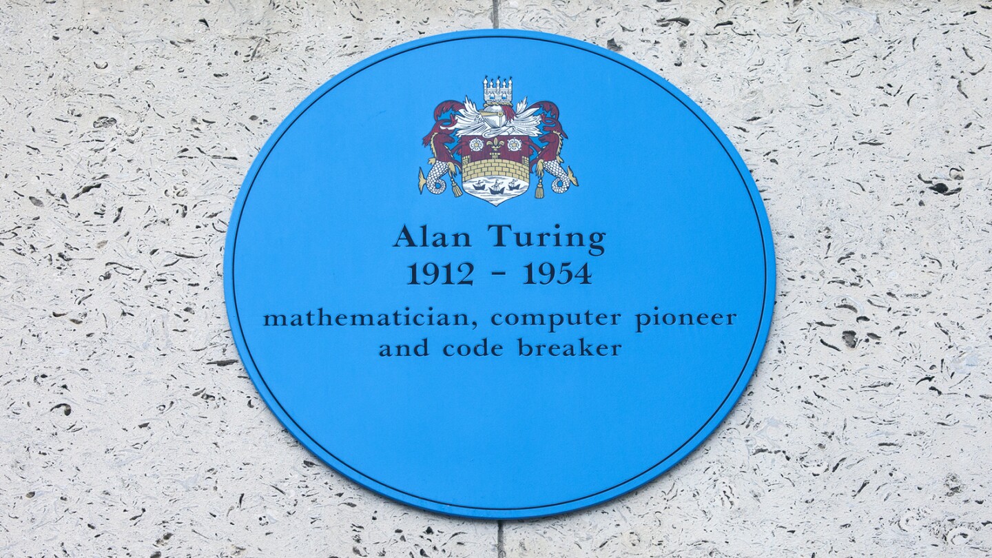 A blue plaque at Kings College in Cambridge commemorating former student and computer pioneer Alan Turing